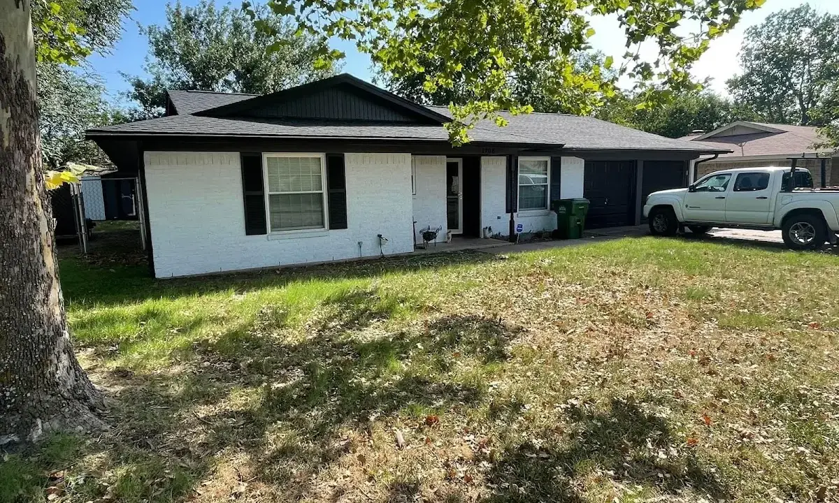 Professional roofing crew working on a residential roof in Jamul